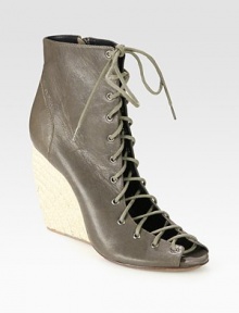 Lustrous leather go-to with a lace-up front and chunky espadrille wedge. Hemp wedge, 4 (100mm)Leather upperSide zipperLeather liningRubber solePadded insoleImportedOUR FIT MODEL RECOMMENDS ordering one size up as this style runs small. Lustrous leather go-to with a lace-up front and chunky espadrille wedge. Hemp wedge, 4 (100mm)Leather upperSide zipperLeather liningRubber solePadded insoleImportedOUR FIT MODEL RECOMMENDS ordering one size up as this style runs small.
