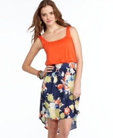 Pump colorful prints into your arsenal of dresses with this style from Living Doll that pairs a solid tank with a vivid, asymmetrical skirt! Pump colorful prints into your arsenal of dresses with this style from Living Doll that pairs a solid tank with a vivid, asymmetrical skirt!