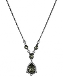 Front and center in fashion. Givenchy shines with this Y-shaped necklace crafted from hematite-tone mixed metal with glass stones adorning it. The pendant glistens with cubic zirconia accents. Approximate length: 16 inches + 2-inch extender.