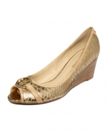 Tommy Hilfiger's Leanna wedge pumps are perfect for those days where you'll be running around all day and night. Tommy Hilfiger's Leanna wedge pumps are perfect for those days where you'll be running around all day and night.