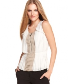 Graphic colorblocking and textural pleats make this Vince Camuto blouse a perfect pick for adding modern edge to your ensemble! Graphic colorblocking and textural pleats make this Vince Camuto blouse a perfect pick for adding modern edge to your ensemble!