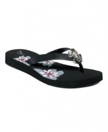 Hop to it! A cute little rhinestone frog perches peacefully on the straps of Marc Fisher's Froggy thong sandals. Hop to it! A cute little rhinestone frog perches peacefully on the straps of Marc Fisher's Froggy thong sandals.