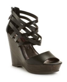 Turn your look around. The Twister sandals by Material Girl take your look from casual to covetable with their intertwined straps, back zipper and stacked wedge heel. Turn your look around. The Twister sandals by Material Girl take your look from casual to covetable with their intertwined straps, back zipper and stacked wedge heel.