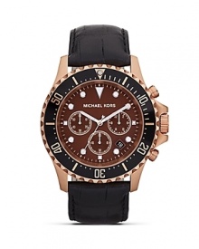 Classically styled accessories are on our radar. Perfect the look with this rose gold watch from MICHAEL Michael Kors, accented by a bold bezel and embossed leather strap. Classically styled accessories are on our radar. Perfect the look with this rose gold watch from MICHAEL Michael Kors, accented by a bold bezel and embossed leather strap.