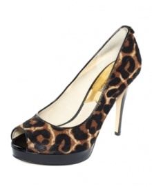 Such a stand out heel. The metallic detail on the heel of MICHAEL Michael Kors' York platform pumps adds a shiny pop of contrast against the sultry textured upper. Such a stand out heel. The metallic detail on the heel of MICHAEL Michael Kors' York platform pumps adds a shiny pop of contrast against the sultry textured upper.
