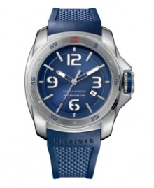 Cool blue but tough as nails. Sport watch by Tommy Hilfiger crafted from navy blue silicone strap and round stainless steel case. Blue numerals and red flag logo at bezel. Brushed blue dial features silver tone stick indices, white numerals at twelve, three, six and nine o'clock, date window at four o'clock, luminous hour and minute hands, red-tipped second hand and text logo. Quartz movement. Water resistant to 50 meters. Ten-year limited warranty.