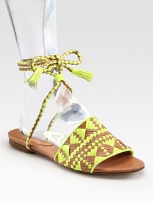 Wondrously woven leather in a vibrant two-tone pattern, topped with tassel ties that wrap around the ankle. Leather upperLeather lining and solePadded insoleImportedbr>OUR FIT MODEL RECOMMENDS ordering true size. Wondrously woven leather in a vibrant two-tone pattern, topped with tassel ties that wrap around the ankle. Leather upperLeather lining and solePadded insoleImportedbr>OUR FIT MODEL RECOMMENDS ordering true size.