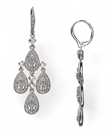Elegant by night, contemporary by day, this pair of Nadri teardrop chandelier earrings says sparkle, crafted of rhodium plate with a cascade of crystal accents. Elegant by night, contemporary by day, this pair of Nadri teardrop chandelier earrings says sparkle, crafted of rhodium plate with a cascade of crystal accents.