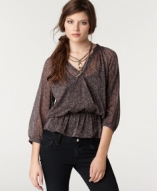 A feminine ruffled peplum adds a girly vintage vibe to this Bar III printed blouse -- perfect for softening up sleek skinny jeans! A feminine ruffled peplum adds a girly vintage vibe to this Bar III printed blouse -- perfect for softening up sleek skinny jeans!