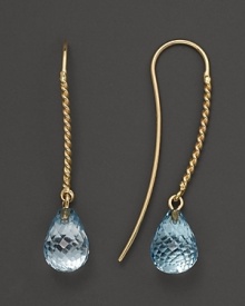 Faceted blue topaz briolettes add rich sparkle to 14K yellow gold. By Nancy B. Faceted blue topaz briolettes add rich sparkle to 14K yellow gold. By Nancy B.