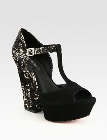 Held in place by an adjustable ankle strap, this suede t-strap design has exotic snakeskin trim and a chunky block heel. Snakeskin print heel, 4 (100mm)Suede platform, 1 (25mm)Compares to a 3 heel (75mm)Snakeskin print and suede upperLeather lining and solePadded insoleImported Held in place by an adjustable ankle strap, this suede t-strap design has exotic snakeskin trim and a chunky block heel. Snakeskin print heel, 4 (100mm)Suede platform, 1 (25mm)Compares to a 3 heel (75mm)Snakeskin print and suede upperLeather lining and solePadded insoleImported