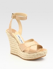 A look that never loses its appeal in shiny patent leather on richly textured rope wedge and platform. Wedge heel, 4¾ (120mm) Platform, 1½ (40mm) Compares to 3¼ heel (80mm) Open toe Crisscross front Adjustable ankle strap Leather lining Rubber sole Made in ItalyOUR FIT MODEL RECOMMENDS ordering true whole size; ½ sizes should order the next whole size up. A look that never loses its appeal in shiny patent leather on richly textured rope wedge and platform. Wedge heel, 4¾ (120mm) Platform, 1½ (40mm) Compares to 3¼ heel (80mm) Open toe Crisscross front Adjustable ankle strap Leather lining Rubber sole Made in ItalyOUR FIT MODEL RECOMMENDS ordering true whole size; ½ sizes should order the next whole size up.