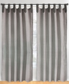 A stylish way to show your stripes. The tab-top design of the Ticking Stripe window panel accents the classic stripe pattern with casual, chic flair. Featuring pure cotton. A stylish way to show your stripes. The tab-top design of the Ticking Stripe window panel accents the classic stripe pattern with casual, chic flair. Featuring pure cotton.