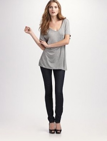 Skinny-fit silhouette in dark denim for an irresistibly chic edgy look.THE FITSkinny fit from hip to hem Rise, about 7 Inseam, about 32THE DETAILSBelt loops Zip fly Five-pocket style Plain back patch pockets 94% cotton/5% polyester/1% spandex; machine wash Made in USA Skinny-fit silhouette in dark denim for an irresistibly chic edgy look.THE FITSkinny fit from hip to hem Rise, about 7 Inseam, about 32THE DETAILSBelt loops Zip fly Five-pocket style Plain back patch pockets 94% cotton/5% polyester/1% spandex; machine wash Made in USA