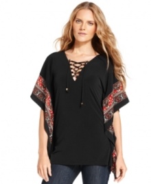 With a romantic, bohemian sensibility, a MICHAEL Michael Kors tunic makes a statement with its lace-up neckline and print-trimmed sleeves. Soft and floaty, it's the perfect way to dress up your favorite denim. With a romantic, bohemian sensibility, a MICHAEL Michael Kors tunic makes a statement with its lace-up neckline and print-trimmed sleeves. Soft and floaty, it's the perfect way to dress up your favorite denim.