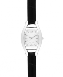 Go back to basics with this classic design, by Nine West. Crafted of textured black leather strap and cushion-shaped silver tone mixed metal case. Silver tone dial with swirling design features silver tone applied stick indices, numerals at twelve and six o'clock, silver tone hour and minute hands, sweeping second hand and logo at six o'clock. Quartz movement. Limited lifetime warranty.