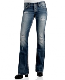 Gritty rips and intense fading lend perfectly worn-in style to Silver Jeans' Pioneer bootcut denim. Gritty rips and intense fading lend perfectly worn-in style to Silver Jeans' Pioneer bootcut denim.