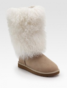 Classic suede style surrounded by an oversized sheepskin cuff. Foam platform, 1 (25mm) Shaft, 12 Leg circumference, 16½ Genuine sheepskin and suede upper Pull-on style Foam sole Padded insole Imported Classic suede style surrounded by an oversized sheepskin cuff. Foam platform, 1 (25mm) Shaft, 12 Leg circumference, 16½ Genuine sheepskin and suede upper Pull-on style Foam sole Padded insole Imported