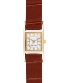 Simplicity yields a stunning finish, by Nine West. Watch crafted of textured brown leather strap and rectangular gold tone mixed metal case. Silver tone dial features gold tone numerals, minute track, gold tone hour and minute hands, sweeping second hand and logo at six o'clock. Quartz movement. Limited lifetime warranty. Simplicity yields a stunning finish, by Nine West. Watch crafted of textured brown leather strap and rectangular gold tone mixed metal case. Silver tone dial features gold tone numerals, minute track, gold tone hour and minute hands, sweeping second hand and logo at six o'clock. Quartz movement. Limited lifetime warranty.
