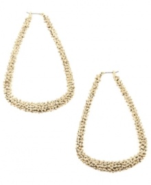 Textured appeal. RACHEL Rachel Roy's non-traditional hoop earrings feature a playful teardrop shape with a unique pebbled surface. Crafted in gold-plated mixed metal. Approximate drop: 3 inches. Approximate diameter: 1-3/4 inches. Textured appeal. RACHEL Rachel Roy's non-traditional hoop earrings feature a playful teardrop shape with a unique pebbled surface. Crafted in gold-plated mixed metal. Approximate drop: 3 inches. Approximate diameter: 1-3/4 inches.