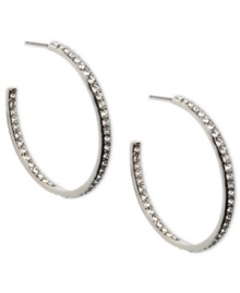 Cover every angle in sparkle. Givenchy's elegant hoop earrings flaunt an inside out design crystallized with Swarovski elements. Crafted in imitation rhodium plated mixed metal. Approximate diameter: 1-5/8 inches. Cover every angle in sparkle. Givenchy's elegant hoop earrings flaunt an inside out design crystallized with Swarovski elements. Crafted in imitation rhodium plated mixed metal. Approximate diameter: 1-5/8 inches.