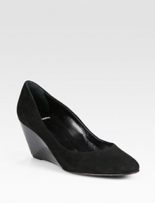 Tried-and-true suede pump with an unexpected patent leather wedge. Patent leather wedge, 3 (75mm)Suede upperLeather lining and solePadded insoleMade in ItalyOUR FIT MODEL RECOMMENDS ordering one size up as this style runs small. Tried-and-true suede pump with an unexpected patent leather wedge. Patent leather wedge, 3 (75mm)Suede upperLeather lining and solePadded insoleMade in ItalyOUR FIT MODEL RECOMMENDS ordering one size up as this style runs small.