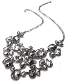 Shimmering stones bring sophistication. This bib necklace from Style&co. is crafted from hematite tone mixed metal with silver tone plastic stones in a range of shapes. Approximate length: 18 inches + 2-inch extender. Approximate drop: 3 inches.