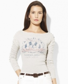 A vintage-inspired graphic and buttons at the shoulders create a chic heritage look on Lauren Jeans Co.'s petite Yadira boatneck tee. A vintage-inspired graphic and buttons at the shoulders create a chic heritage look on Lauren Jeans Co.'s petite Yadira boatneck tee.