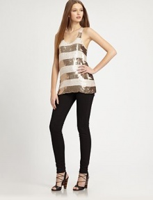 Dazzling sequined stripes over silk charmeuse, all in an easy racerback tank.Wide stripesScoopneckFlat frontRacerbackAbout 27 from shoulder to hemSilkLining; rayonDry cleanImportedModel shown is 5'10 (177cm) wearing US size Small. Dazzling sequined stripes over silk charmeuse, all in an easy racerback tank.Wide stripesScoopneckFlat frontRacerbackAbout 27 from shoulder to hemSilkLining; rayonDry cleanImportedModel shown is 5'10 (177cm) wearing US size Small.