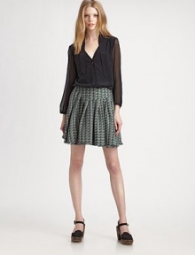 Sheer chiffon sleeves and a sophisticated tie-collar elevate this elegantly-tailored silk button-down.Tie-front collarV necklineGathered sleevesShirttail hemGathered back yokeAbout 23 from shoulder to hemSilkDry cleanMade in ItalyModel shown is 5'10 (177cm) wearing US size 4. Sheer chiffon sleeves and a sophisticated tie-collar elevate this elegantly-tailored silk button-down.Tie-front collarV necklineGathered sleevesShirttail hemGathered back yokeAbout 23 from shoulder to hemSilkDry cleanMade in ItalyModel shown is 5'10 (177cm) wearing US size 4.