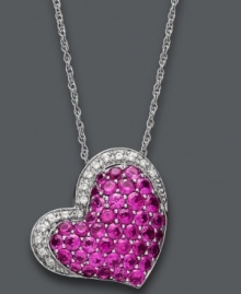 Share your love every day of the year. This stunning heart-shaped pendant sparkles in round-cut rubies (2-1/4 ct. t.w) and sparkling diamond accents. Setting and chain crafted in sterling silver. Approximate length: 18 inches. Approximate drop: 1 inch.