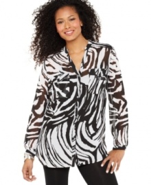 Into the wild! Style&co.'s zebra-print tunic has a graphic look that pairs perfectly with jeans and leggings. Into the wild! Style&co.'s zebra-print tunic has a graphic look that pairs perfectly with jeans and leggings.