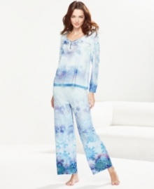 Embrace the lovely decorations of winter while staying warm and cozy in One World's Frozen Snowfall pajamas. Embrace the lovely decorations of winter while staying warm and cozy in One World's Frozen Snowfall pajamas.