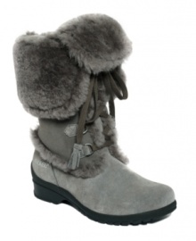 From Russia, with love. The plush faux fur cuff and waterproof suede upper of Khombu's Russia boots set the stage for a warm and cozy winter. Stay grounded with the sturdy lug sole. From Russia, with love. The plush faux fur cuff and waterproof suede upper of Khombu's Russia boots set the stage for a warm and cozy winter. Stay grounded with the sturdy lug sole.
