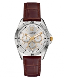 Flashes of golden tones update this brown leather watch from Nautica. Flashes of golden tones update this brown leather watch from Nautica.