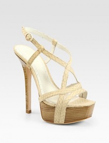 Strappy, snake-embossed leather with an adjustable ankle strap and chunky island platform. Stacked heel, 6 (150mm)Island platform, 2 (50mm)Compares to a 4 heel (100mm)Snake-embossed leather upperLeather liningBuffed leather solePadded insoleImportedOUR FIT MODEL RECOMMENDS ordering one half size up as this style runs small. Strappy, snake-embossed leather with an adjustable ankle strap and chunky island platform. Stacked heel, 6 (150mm)Island platform, 2 (50mm)Compares to a 4 heel (100mm)Snake-embossed leather upperLeather liningBuffed leather solePadded insoleImportedOUR FIT MODEL RECOMMENDS ordering one half size up as this style runs small.