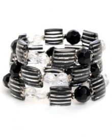 What's the square root of chic? Haskell! This geometrically glam style features three rows of faceted square and round beads in black, clear, and black pinstripe. Set in silver tone mixed metal. Bracelet stretches to fit wrist. Approximate diameter: 2-1/2 inches. What's the square root of chic? Haskell! This geometrically glam style features three rows of faceted square and round beads in black, clear, and black pinstripe. Set in silver tone mixed metal. Bracelet stretches to fit wrist. Approximate diameter: 2-1/2 inches.