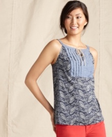 A pretty paisley print and crisp pleated chambray bib make for a prepped-up summery essential, from Tommy Hilfiger. A pretty paisley print and crisp pleated chambray bib make for a prepped-up summery essential, from Tommy Hilfiger.