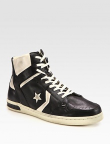 Slightly distressed leather high-top exudes a downtown-cool vibe with endless style possibilities.Leather upperLeather liningPadded insoleRubber soleImported Slightly distressed leather high-top exudes a downtown-cool vibe with endless style possibilities.Leather upperLeather liningPadded insoleRubber soleImported