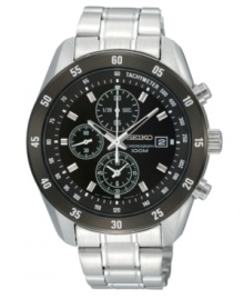 Confident design and trusted precision. Watch by Seiko crafted of stainless steel bracelet and round case. Black bezel with white numerals. Black chronograph dial features tachymeter scale, applied silver tone stick indices, white minute track, date window at three o'clock, three subdials, three hands and logo. Quartz movement. Water resistant to 100 meters. Three-year limited warranty. Confident design and trusted precision. Watch by Seiko crafted of stainless steel bracelet and round case. Black bezel with white numerals. Black chronograph dial features tachymeter scale, applied silver tone stick indices, white minute track, date window at three o'clock, three subdials, three hands and logo. Quartz movement. Water resistant to 100 meters. Three-year limited warranty.
