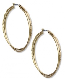 Fashion with a twist. Jones New York's double hoop earrings lend vintage appeal. Crafted of worn gold tone mixed metal. Approximate diameter: 1 inch. Fashion with a twist. Jones New York's double hoop earrings lend vintage appeal. Crafted of worn gold tone mixed metal. Approximate diameter: 1 inch.