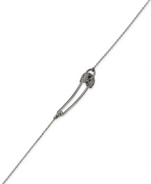 You're safe with sparkling sophistication. This thin bracelet from Juicy Couture features a safety pin embellished with crystal accents. Crafted in silver tone bronze. Approximate length: 7 inches + 1-inch extender. You're safe with sparkling sophistication. This thin bracelet from Juicy Couture features a safety pin embellished with crystal accents. Crafted in silver tone bronze. Approximate length: 7 inches + 1-inch extender.