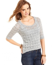 Layer-up this season in an open-knit sweater that comes loaded with metallic threading for a shot of pizzazz! Layer-up this season in an open-knit sweater that comes loaded with metallic threading for a shot of pizzazz!