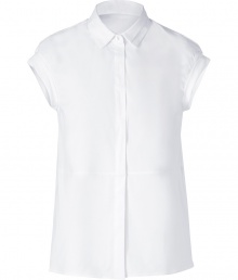 With a pristine look and contemporary double layered collar, Brunello Cucinellis cap sleeve shirt is a sleek way to set the foundation for chic layered looks - Double layer classic collar, cuffed cap sleeves, hidden front button panel - Loosely tailored fit - Wear with slim-fit separates, a luxe cashmere knit and ankle boots With a pristine look and contemporary double layered collar, Brunello Cucinellis cap sleeve shirt is a sleek way to set the foundation for chic layered looks - Double layer classic collar, cuffed cap sleeves, hidden front button panel - Loosely tailored fit - Wear with slim-fit separates, a luxe cashmere knit and ankle boots