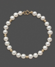 The perfect strand of pearls for a special little girl. This children's bracelet features cultured freshwater pearls (5-6 mm) and 14k gold bead accents in a 14k gold setting. Approximate length: 6 inches. The perfect strand of pearls for a special little girl. This children's bracelet features cultured freshwater pearls (5-6 mm) and 14k gold bead accents in a 14k gold setting. Approximate length: 6 inches.