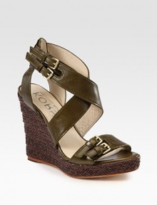 Wide, adjustable leather straps, elevated by a braided leather wedge and platform. Braided leather wedge, 4 (100mm)Braided leather platform, 1 (25mm)Compares to a 3 heel (75mm)Leather upperLeather lining and solePadded insoleImported Wide, adjustable leather straps, elevated by a braided leather wedge and platform. Braided leather wedge, 4 (100mm)Braided leather platform, 1 (25mm)Compares to a 3 heel (75mm)Leather upperLeather lining and solePadded insoleImported