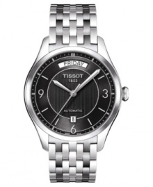 Classically handsome, this automatic Tissot watch features a stainless steel bracelet and round case. Black textured dial with logo, day window, date window, silvertone stick indices and numerals at three o'clock, six o'clock and nine o'clock. Automatic movement. Water resistant to 50 meters. Two-year limited warranty. Classically handsome, this automatic Tissot watch features a stainless steel bracelet and round case. Black textured dial with logo, day window, date window, silvertone stick indices and numerals at three o'clock, six o'clock and nine o'clock. Automatic movement. Water resistant to 50 meters. Two-year limited warranty.