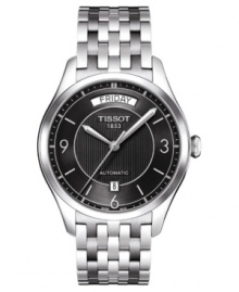 Classically handsome, this automatic Tissot watch features a stainless steel bracelet and round case. Black textured dial with logo, day window, date window, silvertone stick indices and numerals at three o'clock, six o'clock and nine o'clock. Automatic movement. Water resistant to 50 meters. Two-year limited warranty.