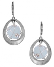 Geometrically chic. Kenneth Cole New York's sweet orbital style features semi-precious amazonite, a trendy wire wrapping, sparkling crystal accents, and a cut-out silver tone mixed metal setting. Approximate drop: 1-3/4 inches. Geometrically chic. Kenneth Cole New York's sweet orbital style features semi-precious amazonite, a trendy wire wrapping, sparkling crystal accents, and a cut-out silver tone mixed metal setting. Approximate drop: 1-3/4 inches.