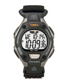Strap it on and hit the ground running with this digital Ironman watch by Timex. Black Velcro® strap and round gray resin case. Orange logo at bezel. Positive display digital dial features initial time, day, date, seconds and 30-lap memory recall. Quartz movement. Water resistant to 100 meters. One-year limited warranty. Strap it on and hit the ground running with this digital Ironman watch by Timex. Black Velcro® strap and round gray resin case. Orange logo at bezel. Positive display digital dial features initial time, day, date, seconds and 30-lap memory recall. Quartz movement. Water resistant to 100 meters. One-year limited warranty.